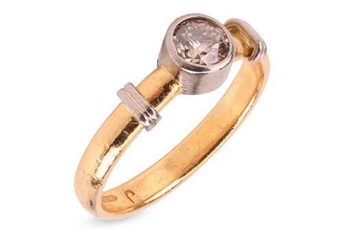 Lot 284 - A diamond solitaire ring; set with a...