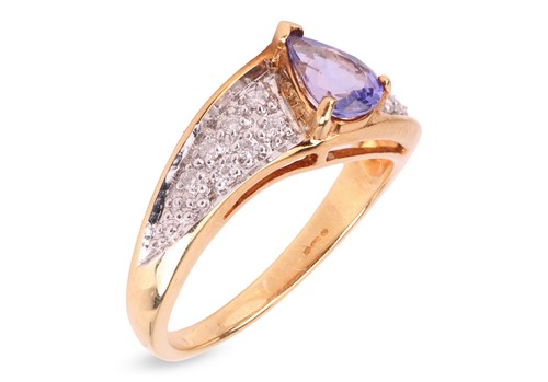 Lot 95 - A modern 18ct gold tanzanite and diamond dress...