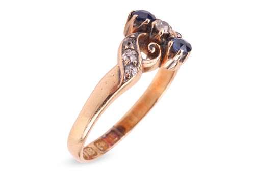 Lot 255 - An Edwardian 18ct gold sapphire and diamond...
