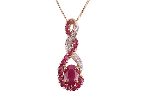 Lot 262 - A 9ct gold ruby and diamond pendant and chain,...