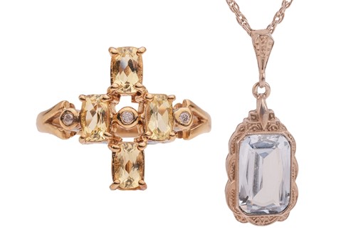 Lot 130 - A citrine and diamond dress ring, set with...