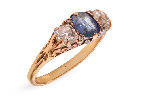 Lot 76 - A sapphire and diamond half-hoop ring, centred...