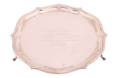 Lot 466 - A silver salver with reeded and ribbon border...