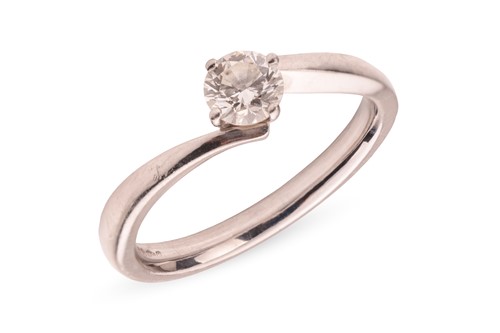 Lot 105 - A diamond solitaire ring, comprising a round...