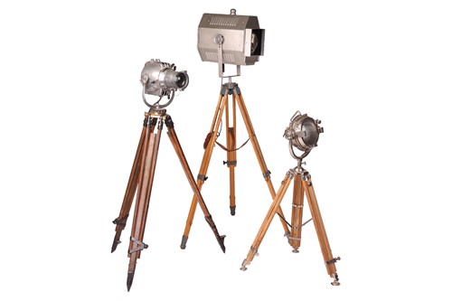Lot 136 - Three studio lights on adjustable tripod bases,...