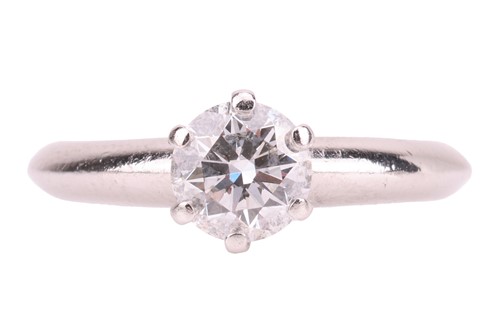 Lot 293 - Tiffany & Co. - a diamond solitaire ring in...