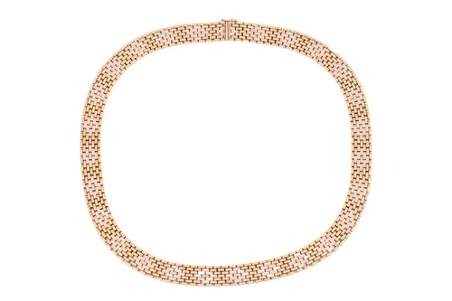 Lot 231 - A two-tone brick link necklace, comprising...