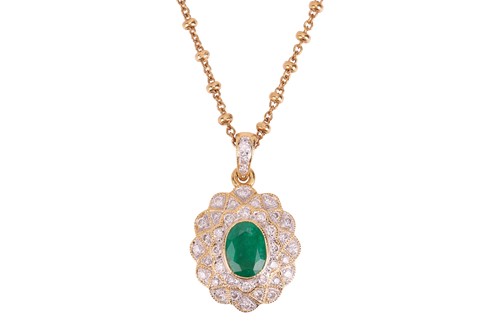 Lot 178 - An emerald and diamond cluster pendant on...