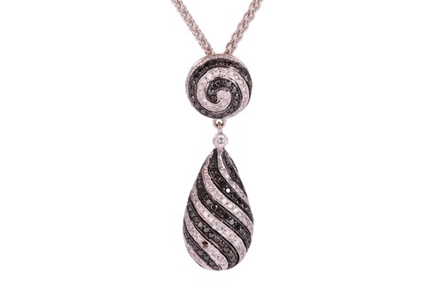 Lot 176 - A diamond and black diamond-set pendant,...