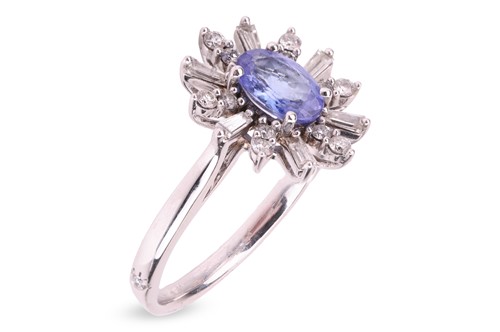 Lot 138 - A tanzanite and diamond floral cluster ring,...