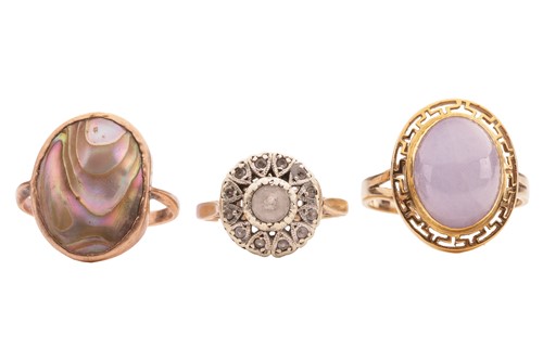 Lot 37 - A group of gem-set rings; The first a lavender...