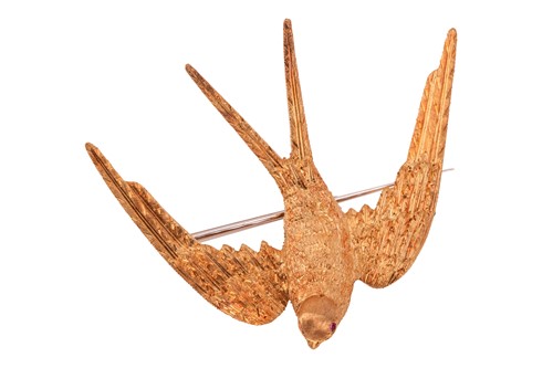 Lot 193 - Garrard & Co. - a swallow brooch in 18ct...