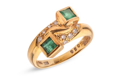 Lot 82 - An emerald and diamond-set crossover ring,...