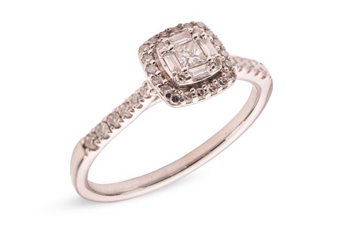 Lot 57 - A diamond-set cluster ring, in 9ct white gold,...