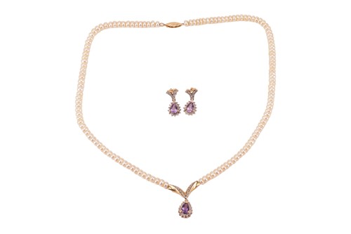 Lot 263 - An amethyst and pearl necklace and earrings...