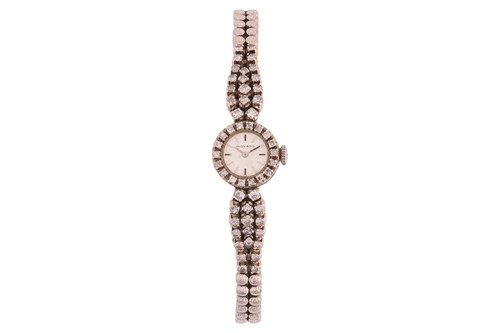 Lot 372 - Movado – A lady’s diamond-set cocktail watch,...