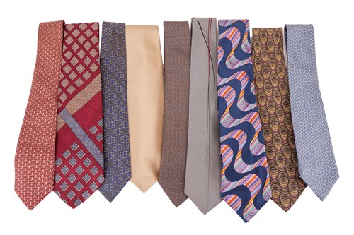 Lot 123 - A collection of nine designer silk ties;...