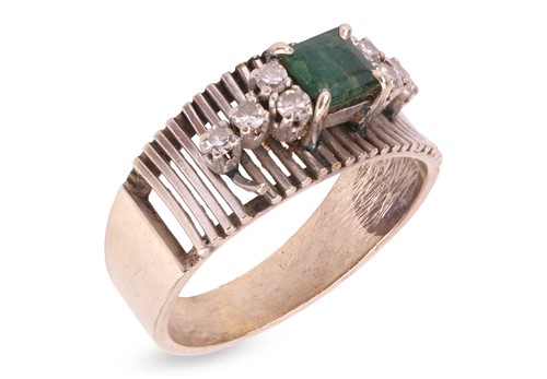 Lot 37 - An emerald and diamond dress ring, comprising...