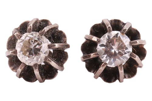 Lot 214 - A pair of diamond stud earrings, with an...