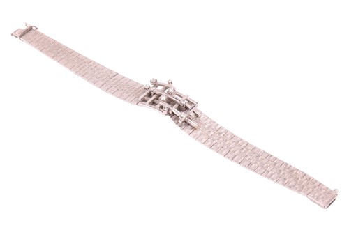 Lot 106 - A Modernist diamond-set bracelet, comprising a...