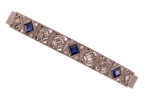 Lot 68 - A synthetic sapphire and diamond bracelet, the...