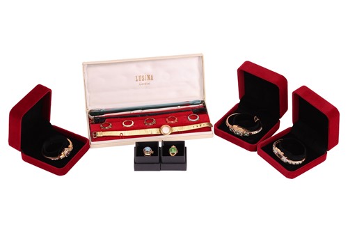 Lot 94 - Three gilt metal and paste bangle cocktail...