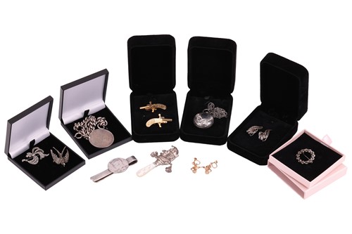 Lot 50 - A silver curb pattern watch chain, now a...