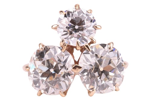 Lot 336 - A three-stone diamond ring, with an estimated...
