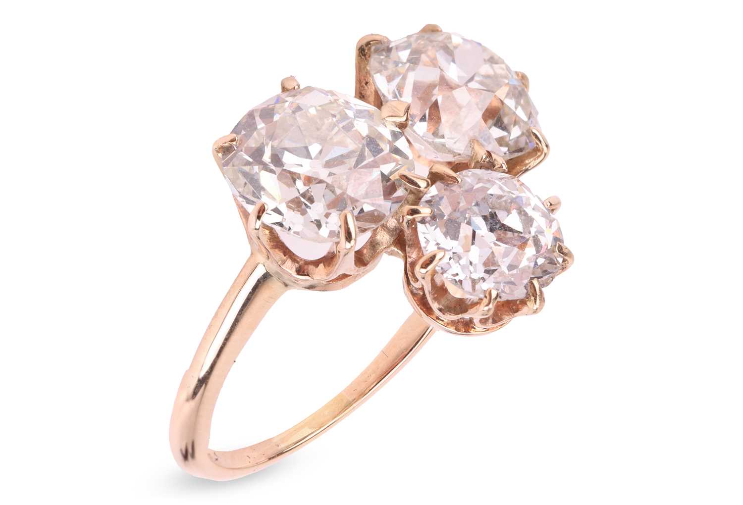 Lot 336 - A three-stone diamond ring, with an estimated...