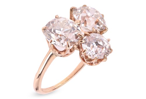 Lot 336 - A three-stone diamond ring, with an estimated...