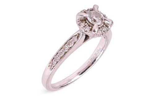 Lot A diamond cluster ring, comprising a central...
