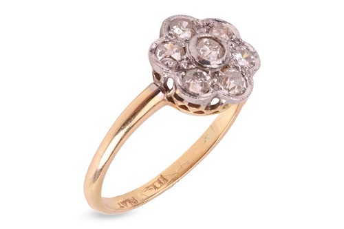 Lot 222 - A diamond-set floral cluster ring, featuring...
