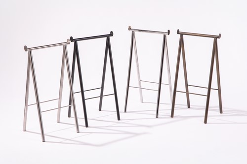 Lot 42 - A near pair of stainless steel trestle bases,...