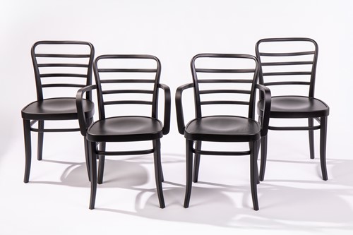Lot 66 - Four Thonet style ebonised chairs, for...