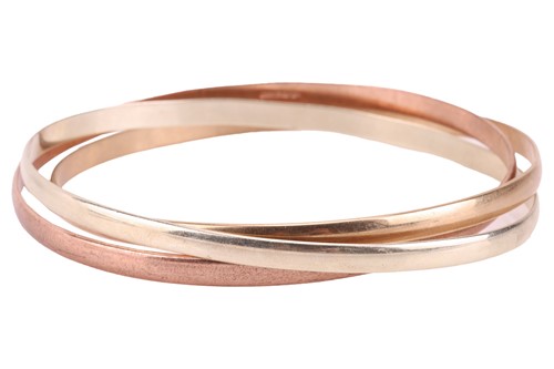 Lot 78 - A 9ct tri-colour gold Russian bangle, composed...