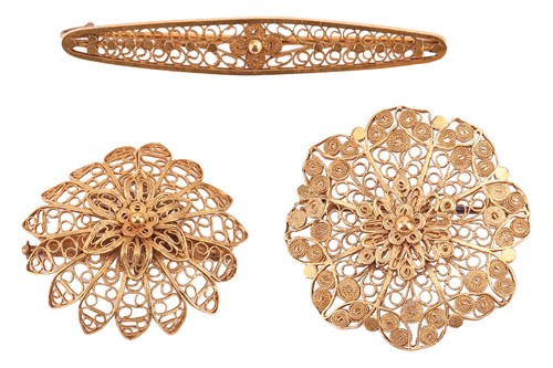 Lot 120 - Three filigree brooches, comprising a filigree...