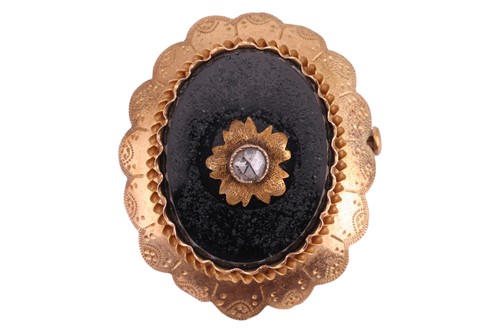 Lot 224 - An onyx mourning brooch and ring set, and a...