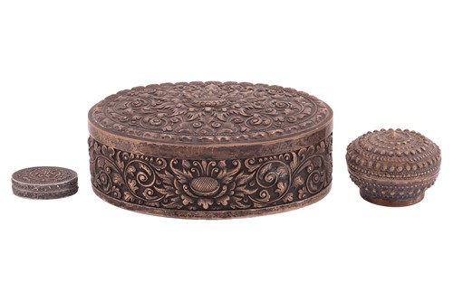 Lot 460 - An Indonesian white metal embossed oval box...