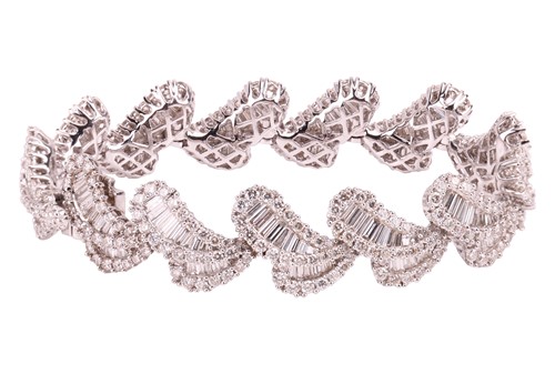 Lot A diamond-set bracelet of stylised petal...