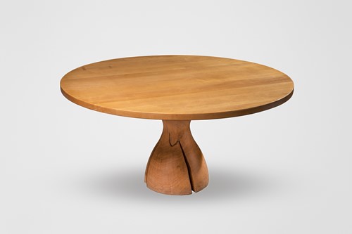 Lot 36 - A large oak circular dining table by Benchmark...