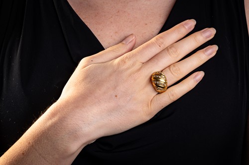 Lot Grima - a diamond-set bombe ring, of ribbed...