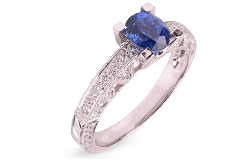 Lot A sapphire and diamond dress ring, of...