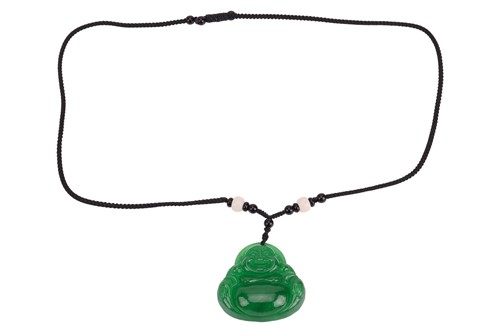 Lot 136 - A carved jadeite Buddha necklace, the carved...
