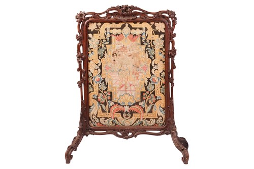 Lot A carved oak firescreen with tapestry and...