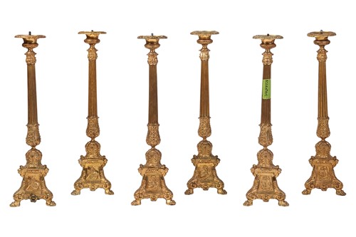 Lot A suite of six French brass altar-type...