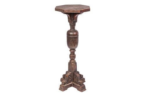 Lot A large and imposing oak torchere constructed...