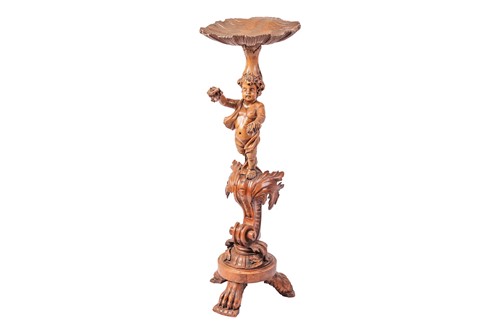 Lot An Italian Baroque revival carved limewood and...