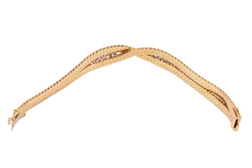 Lot A diamond-set bracelet, composed of two...