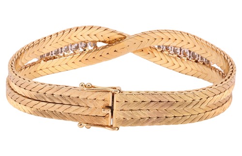 Lot A diamond-set bracelet, composed of two...