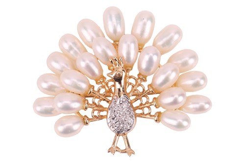 Lot A gem-set peacock brooch cum pendant, sculpted...